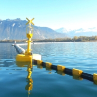Navigation buoys adapted to hold a containment boom